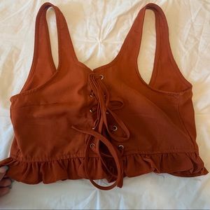 lace up ruffle orange top from fashion nova